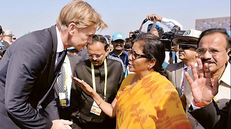 Defence Minister Nirmala Sitharaman interacts with foreign delegates at the inauguration of Aero India 2019 at Yelahanka Airbase, in Bengaluru on Wednesday  R. Samuel