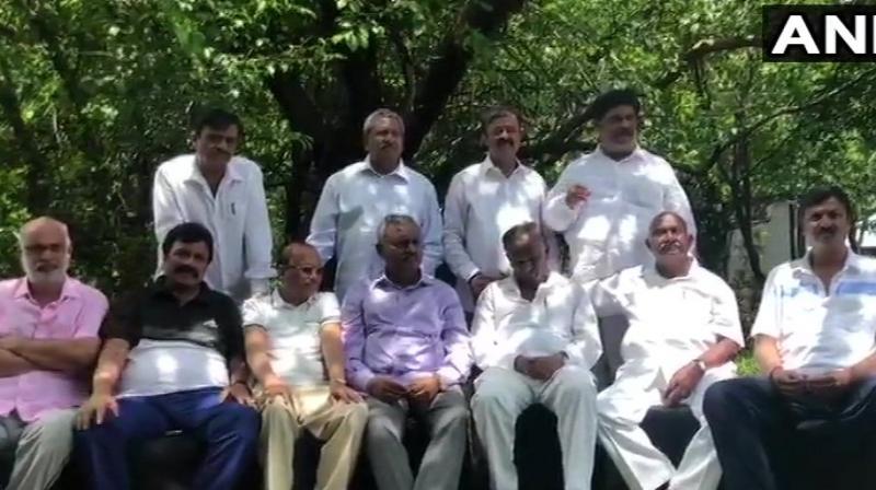 Karnataka rebel MLAs may seek Sai Baba\s blessings