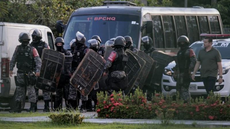 At least 57 inmates killed, several beheaded in bloody clash in Brazil prison