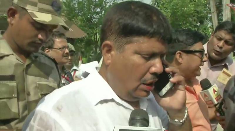 TMC workers said, I was attacked by TMC goons who have been brought from outside. (Photo: ANI | Twitter)