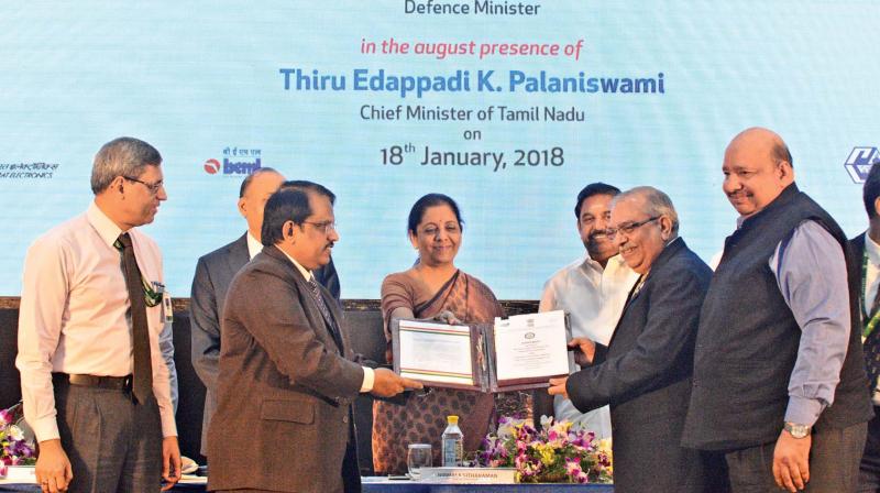 Defence minister Nirmala Sitharaman hands over three ToT agreements of DRDO to industry one each for Army, Navy, Air Force  during the inaugural function of Defence Industry Development Meet for forging new partnership with industry for defence production at Kalaivanar Arangam, in the city on Thursday. Chief Minister Edappadi K. Palaniswami also seen. 	DC