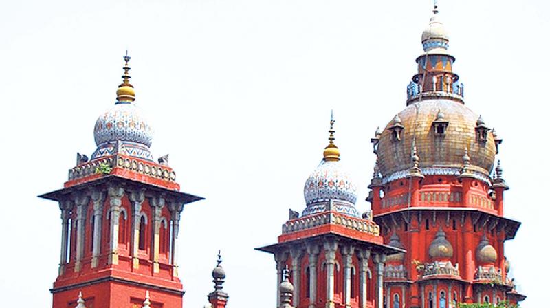 Madras HC not only upheld the Labour court order but also directed the management of Metropolitan Transport Corporation to pay 50 per cent wage arrears from the date of the award till his superannuation.
