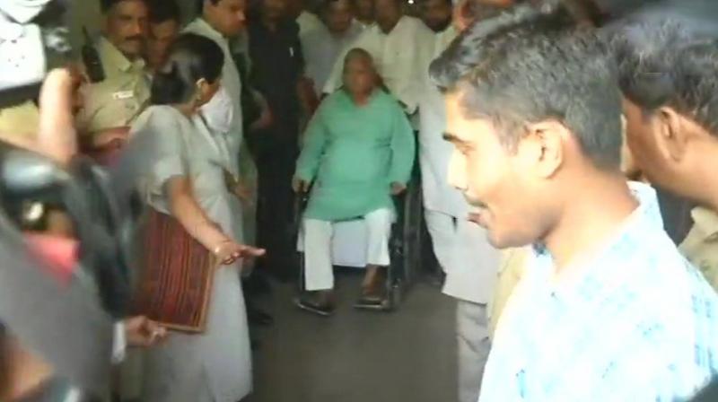 RJD chief Lalu Prasad Yadav, who was undergoing treatment for various ailments related to heart and kidney, was discharged from the All India Institute of Medical Sciences on Monday. (Photo: ANI/Twitter)