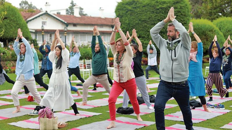 Overseas guests take yoga lessons at a hotel in Ooty.	DC