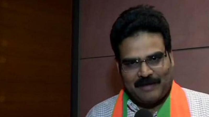 Chandrababu Naidu\s TDP spokesperson Lanka Dinakar joins BJP