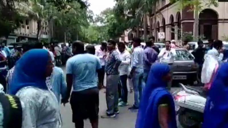 Municipal Corporation employees protest against BJP MLA Akash Vijayvargiya