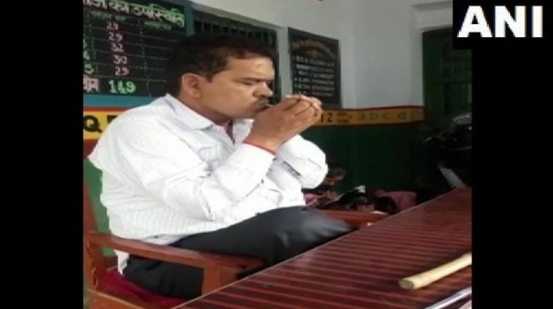 UP teacher suspended after video of him smoking in class goes viral