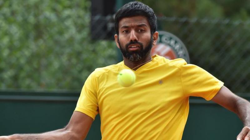 Rohan Bopanna became only the fourth Indian to win a Grand Slam after Leander Paes, Mahesh Bhupathi and Sania Mirza.(Photo: AFP)