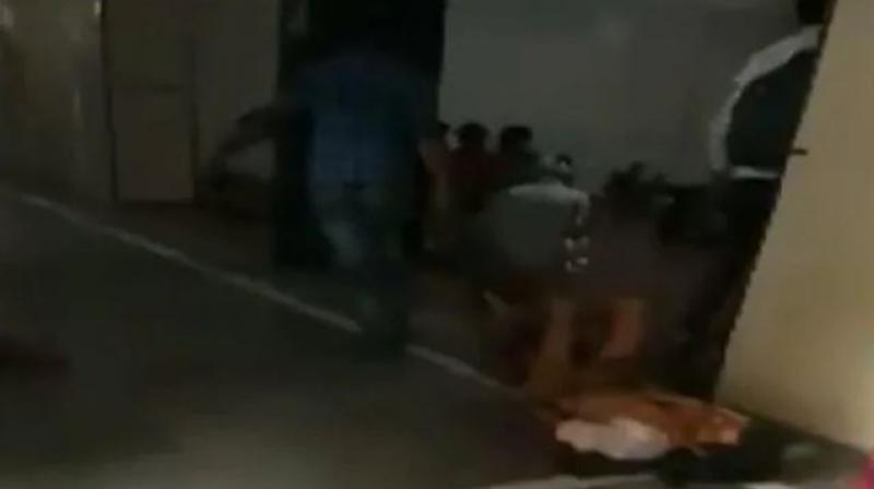 Watch: Jabalpur hospital staff drags patient for X-Ray on bed sheet
