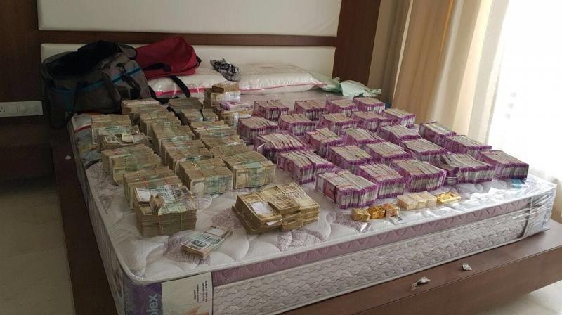 Cash found during Income Tax raids (Photo: ANI Twitter)
