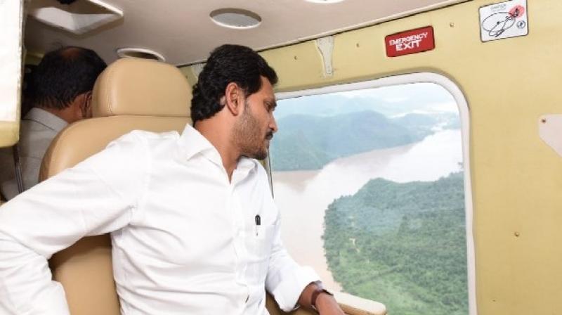 Andhra CM announces additional aid of Rs 5,000 to kin of flood victims