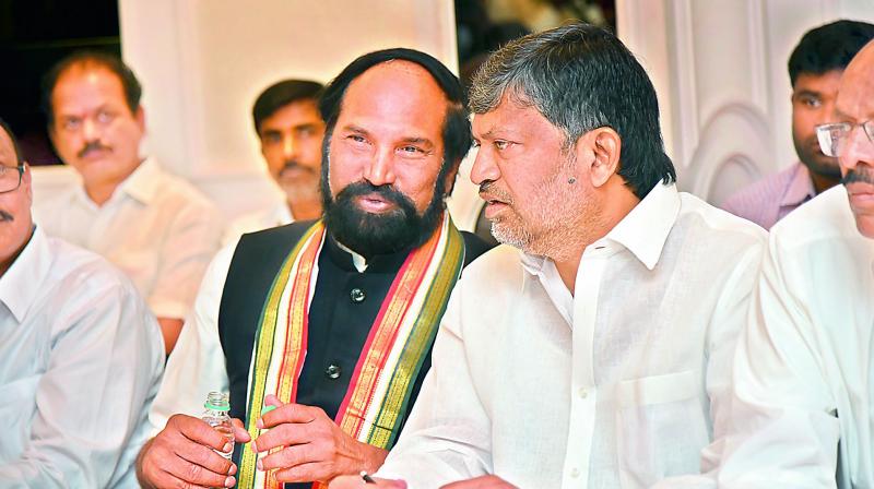 TPCC president N. Uttam Kumar Reddy and TD chief  L. Ramana at a meeting organised by the JAC in Hyderabad on Wednesday. 	Image: DC