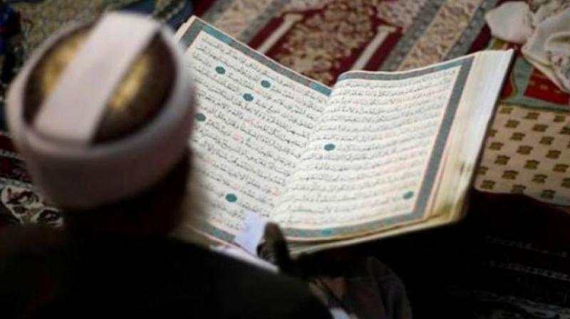 After PM asks to take care of minorities, U\khand BJP keeps Quran at party library