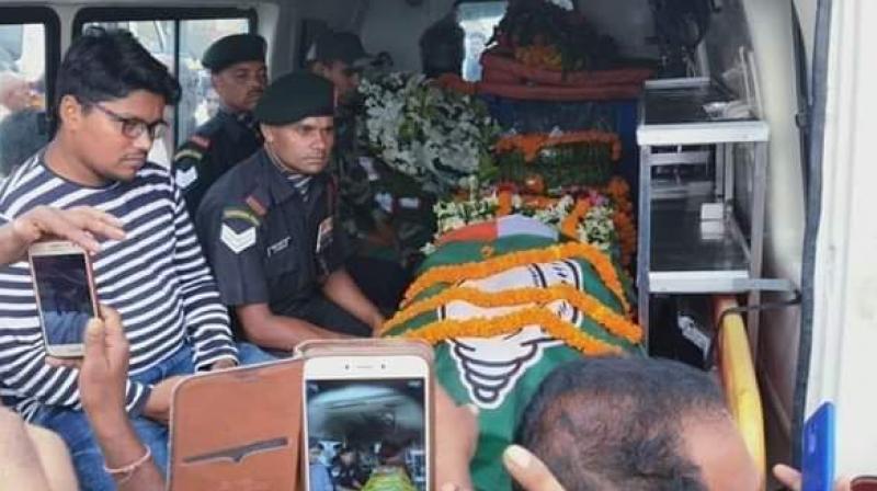 BJD facing flak over party flag on coffin of Odisha jawan martyred in Pulwama