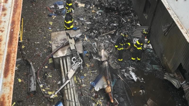 Helicopter crash-lands on roof of Manhattan building, pilot killed