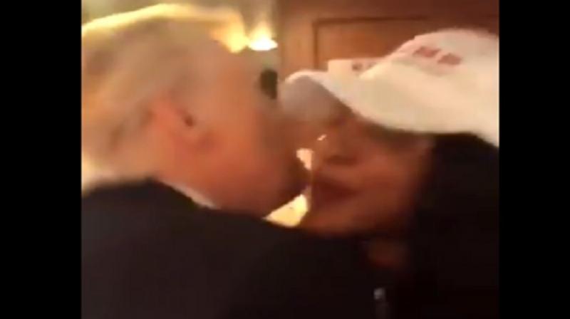 Watch: Donald Trump seen kissing former aide, see what his team has to say