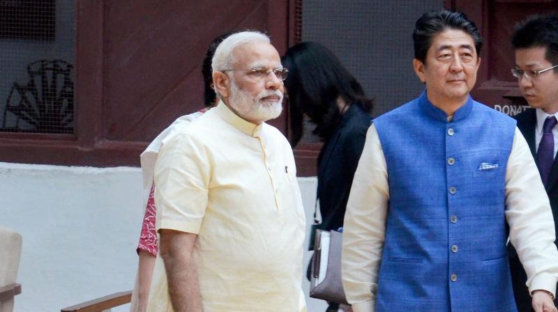 Prime Minister Narendra Modi and his Japanese counterpart Shinzo Abe, who arrived in Ahmedabad on Wednesday on a two-day visit. (Photo: PTI)