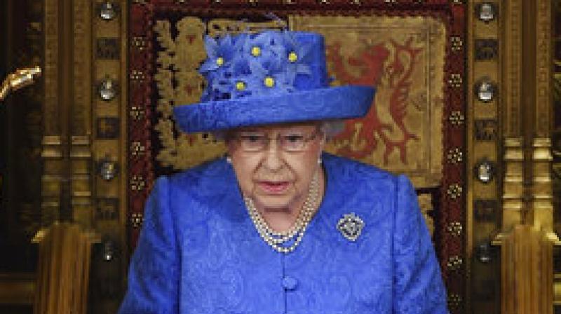 The queen, at an occasion shorn of its usual pageantry, read out the watered-down list of proposed legislation and lawmakers will then spend the next few days debating before bringing it to a vote. (Photo: AP)