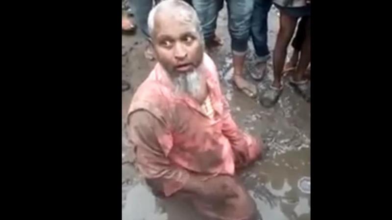 Watch: Assam man thrashed by mob, forced to eat pork for \selling\ beef