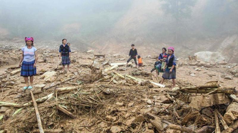 Floods and landslides caused by torrential rains have killed 26 people and left 15 missing in Vietnams mountainous north, authorities said on Monday.