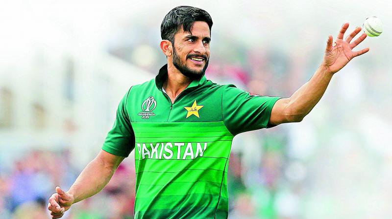 Pakistans Hasan Ali collects the ball during the game against England.