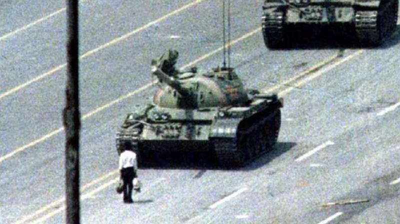 Tiananmen Square photographer behind iconic \tank man\ shot passes away at 64