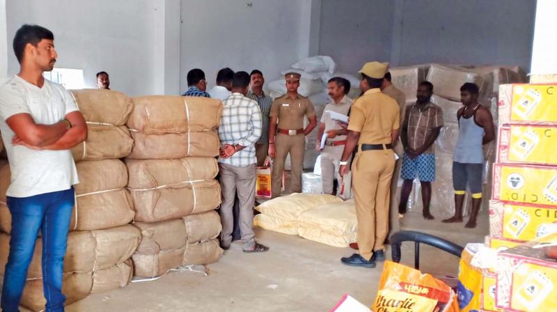 Cops on Friday raid a godown at Poonamallee and seize 10 tonnes of banned gutka and  tobacco products.  	 DC