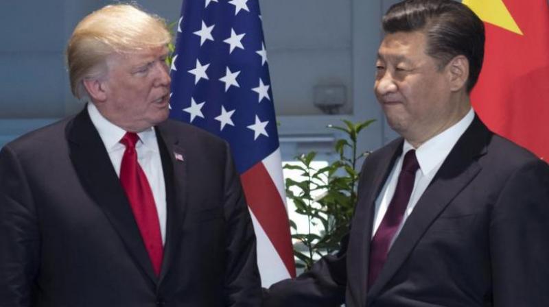 A high-octane trade dispute between the worlds two largest economies - China and the US - will harm global trade this year as it would give rise to protectionism, an EIU report says.