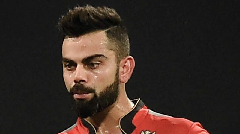 â€œAs it was his teams first offence of the season under the IPLs Code of Conduct relating to minimum over-rate offences, Mr Kohli was fined Rs 12 lakh,â€ said IPL media release. (Photo: PTI)