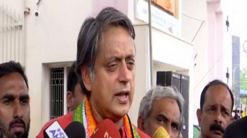 Tharoor calls BJP a \sinking ship\ as it swings into celebratory mode