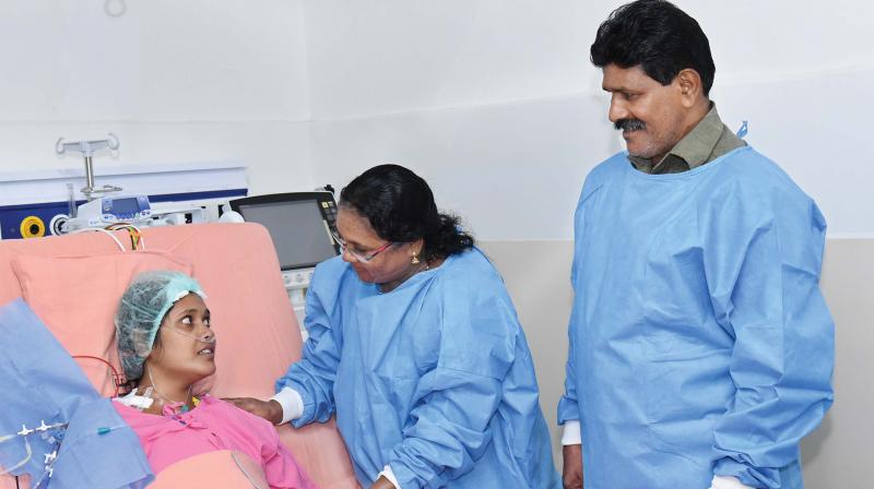 Jenisha with parents at hospital. (Inset) M. Nithin who donated the organs.