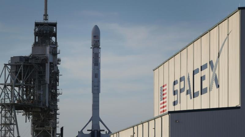 SpaceX is working on a crew capsule that could carry humans into orbit as early as next year. (Photo: AFP)