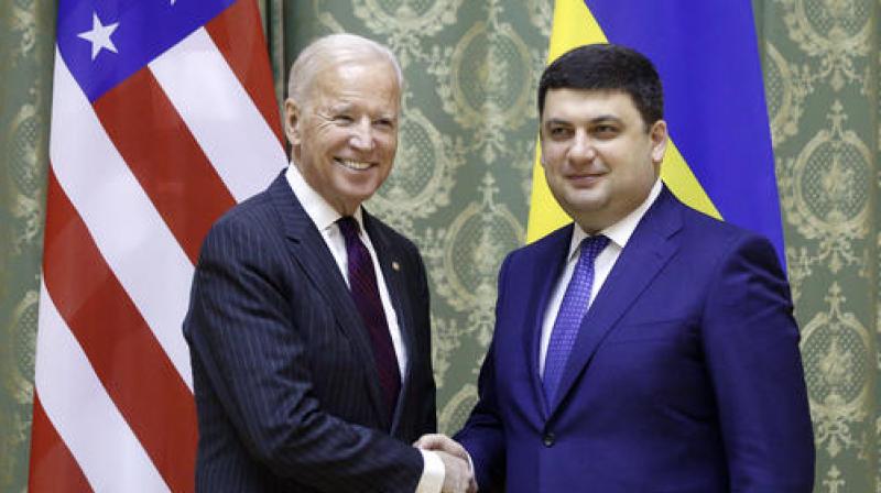 U.S. Vice President Joe Biden, left, and Ukrainian Prime Minister Volodymyr Groysman pose for a photo during a meeting in Kiev, Ukraine on Monday. (Photo: AP)