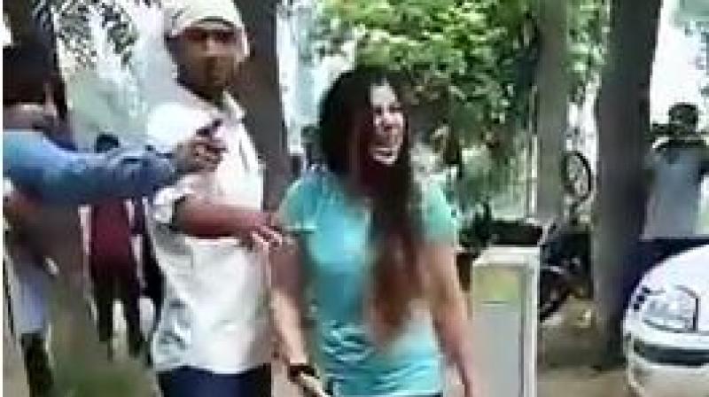 Watch: Couple in Gurgaon held for dragging cop on car bonnet, assaulting journalists
