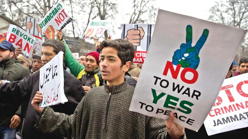 Kashmiri supporters of the Peoples Democratic Party (PDP) shout slogans against banning of Jamaat-e-Islami, the largest  political and religious group in Kashmir.  (PTI)