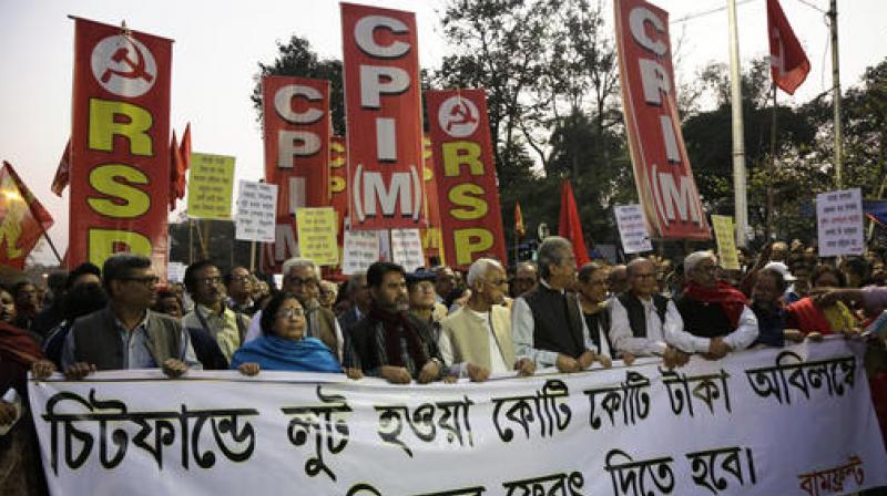 TMC activists shouting slogans against PM Narendra Modi during a protest rally in Kolkata (Photo: PTI)