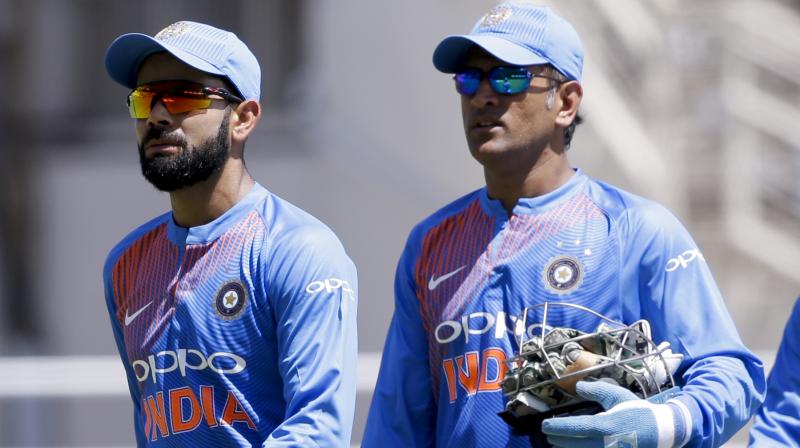Virat Kohli has never shied away from consulting MS Dhoni in pressure-cooker situations. (Photo: AP)
