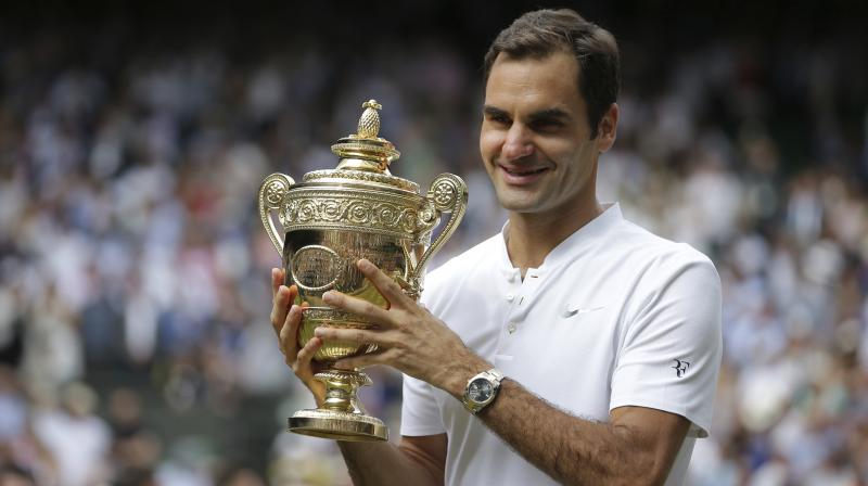 Federer became the only man on Sunday to win eight Wimbledon titles. (Photo: AP)