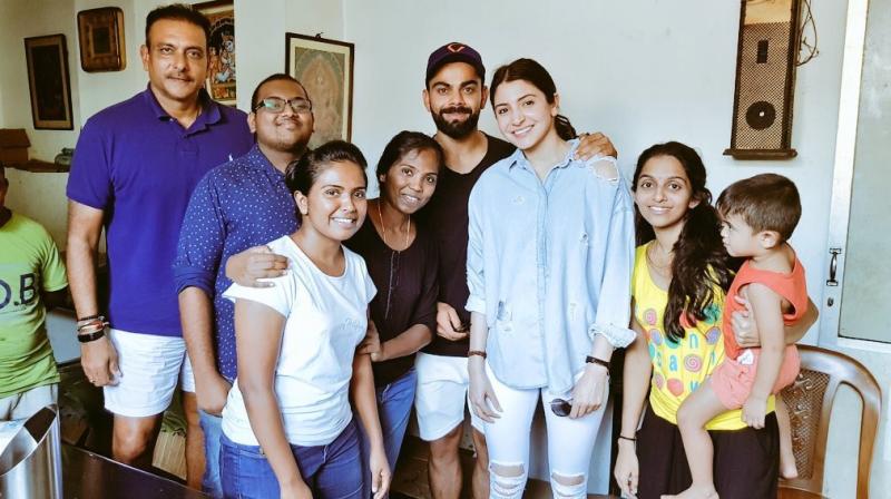 Virat Kohli, Anushka Sharma and Ravi Shastri pictured with Sri Lankan fans who visited their hotel. (Photo: Twitter)
