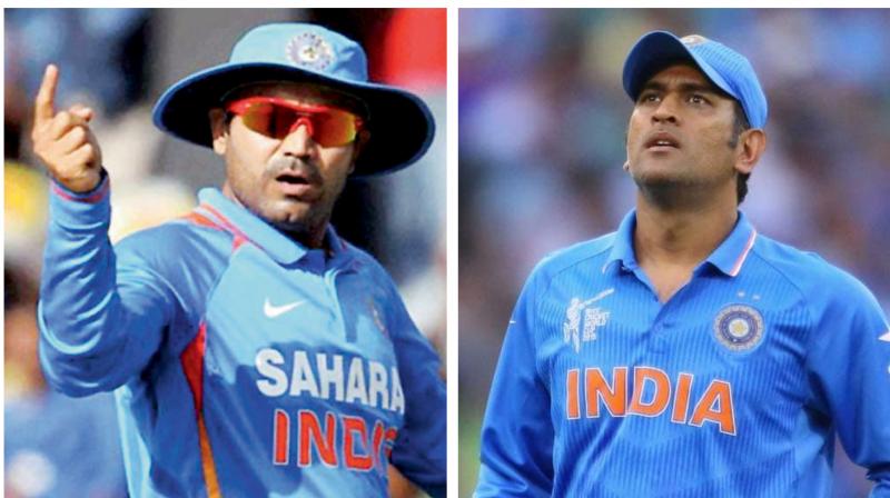 \Selectors should inform Dhoni if they have decided to move forward\: Sehwag