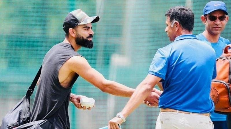 Twitter erupts after Virat Kohli shares picture with Rahul Dravid