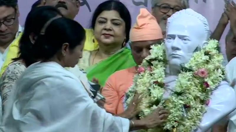West Bengal Chief Minister Mamata Banerjee unveils Vidyasagars statue. (Photo: Twitter/ ANI)
