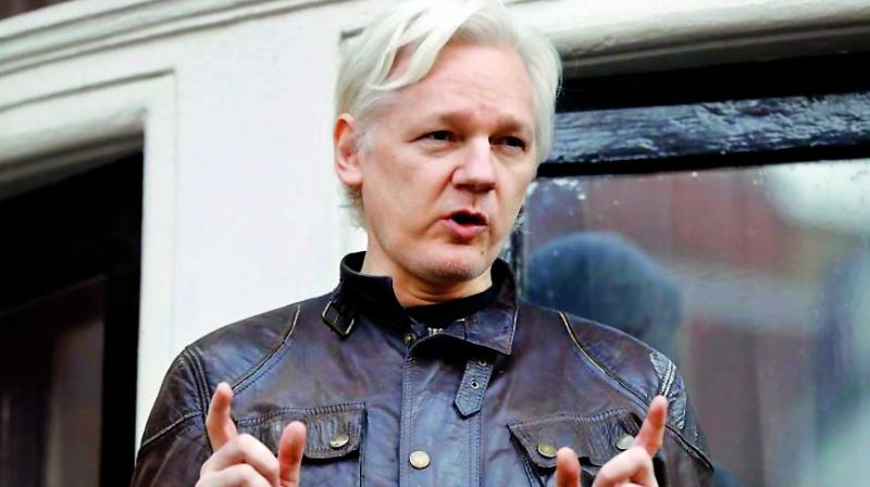 Frail Julian Assange appears in UK court ahead of extradition hearing