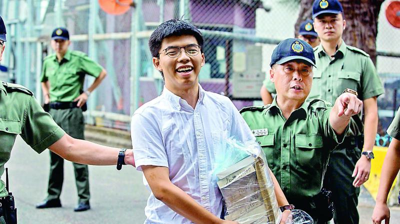Hong Kongâ€™s activist Joshua Wong leaves jail
