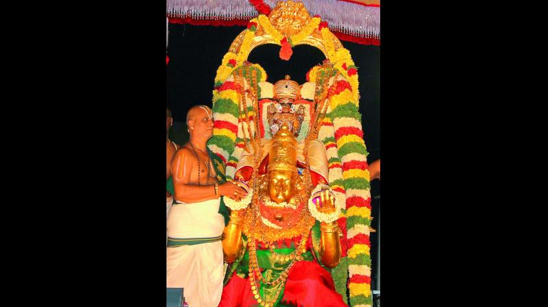 Lord Malayappa Swamy taken on a celestial ride on Garuda Vahanam atop Tirumala, as part of the monthly Pournami Garuda Seva on Monday. 	 DC