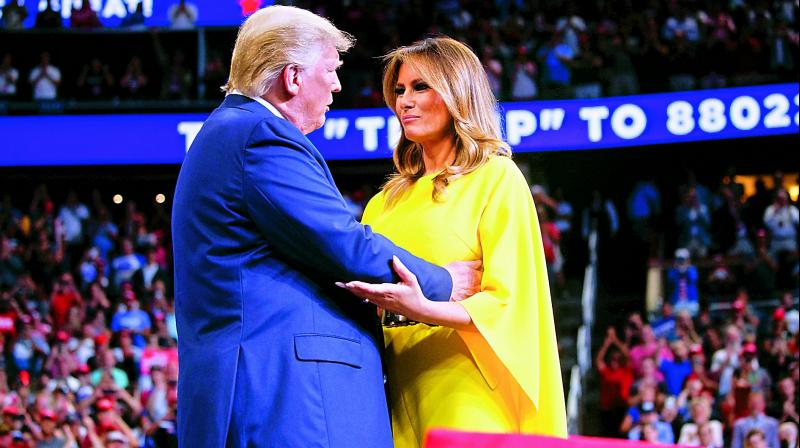 US President Donald Trump arrives to speak at his re-election kickoff rally with first lady Melania Trump at the Amway Centre on Tuesday in Orlando, Florida.  	 AP