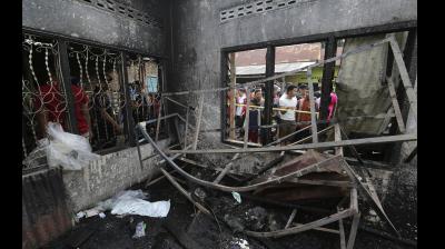 At least two dozen people were killed when a fire ripped through a matchstick warehouse in Indonesia on Friday, authorities said. (Photo: AP)