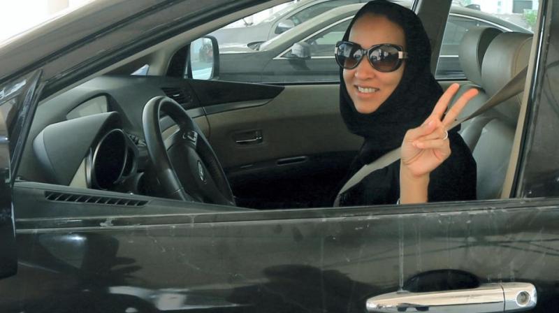 Behind the wheel, a year on: Saudi women savour new freedom