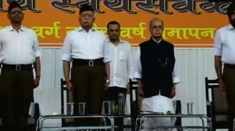 Former president Pranab Mukherjee with RSS chief Mohan Bhagwat as RSS event begins. (Photo: Twitter/ ANI)
