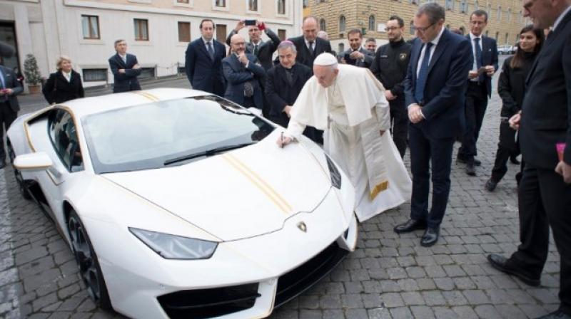 The special-edition sports car, which boasts a 610 metric horsepower, is expected to sell for significantly more than its Italian retail price of around â‚¬200,000. (Photo: AFP)